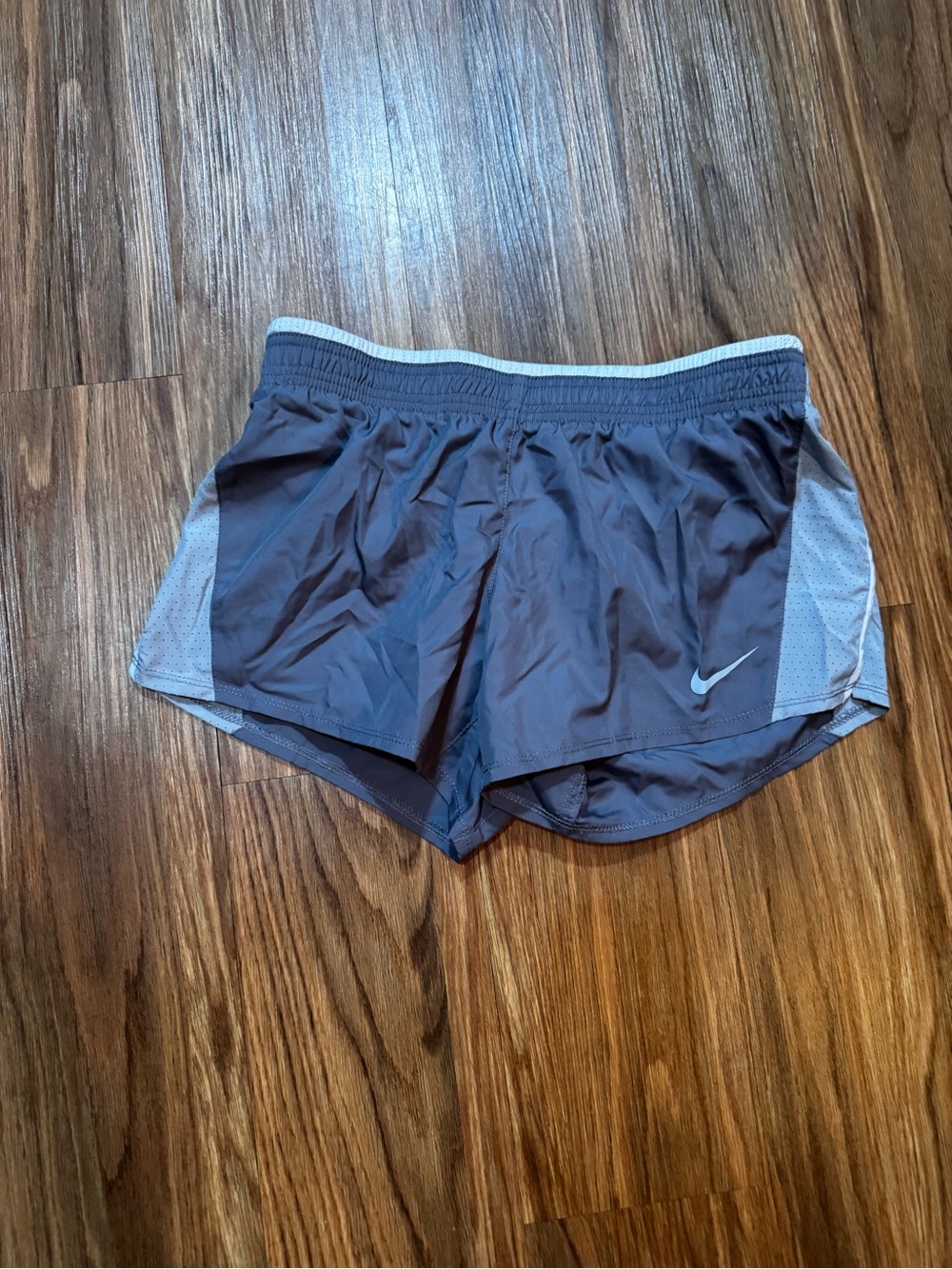 Nike Women's Charcoal Gray Athletic Shorts with Light Gray Panels
